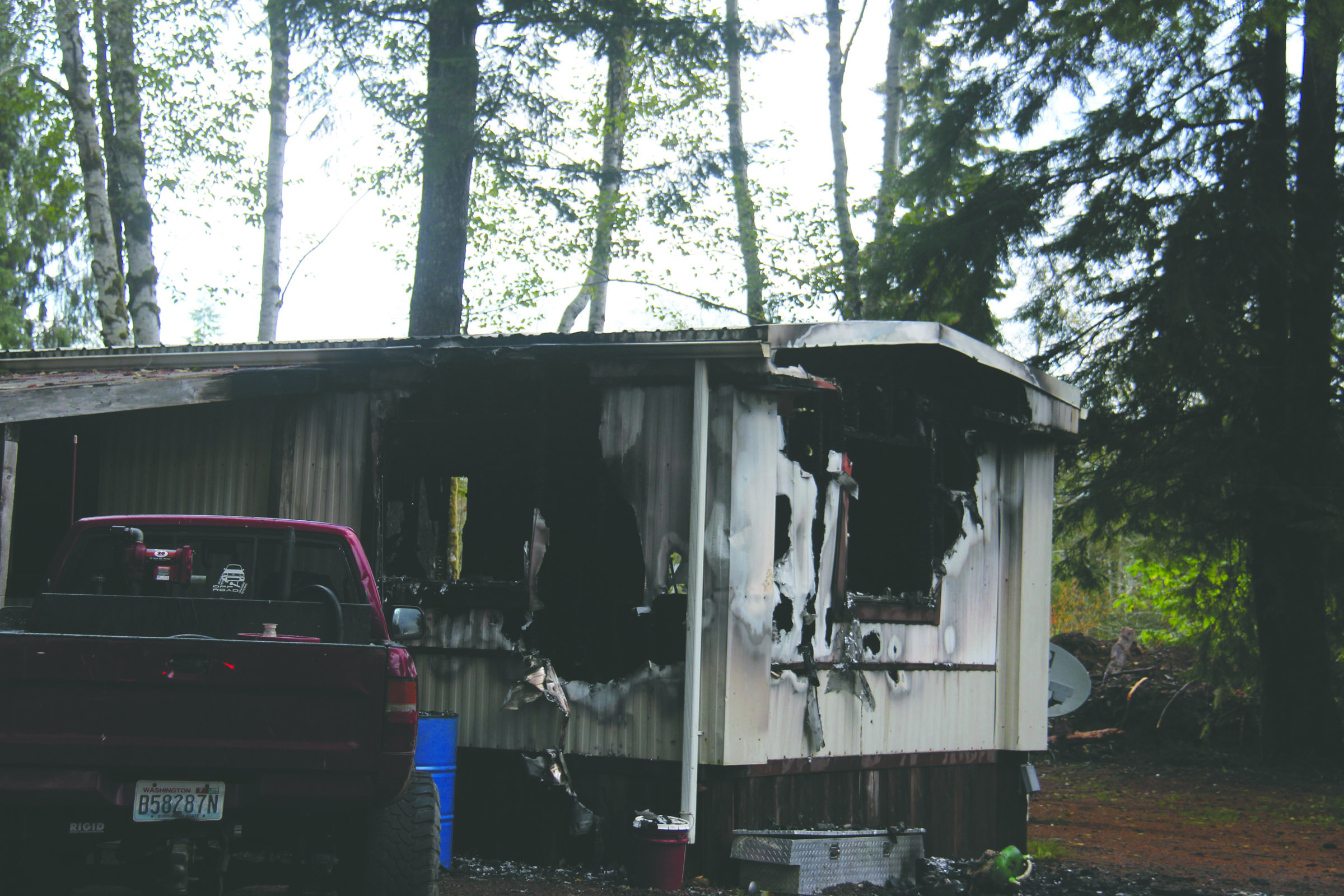 A mobile home burned early Sunday morning on Merchance Road in Forks. Christi Baron/Forks Forum