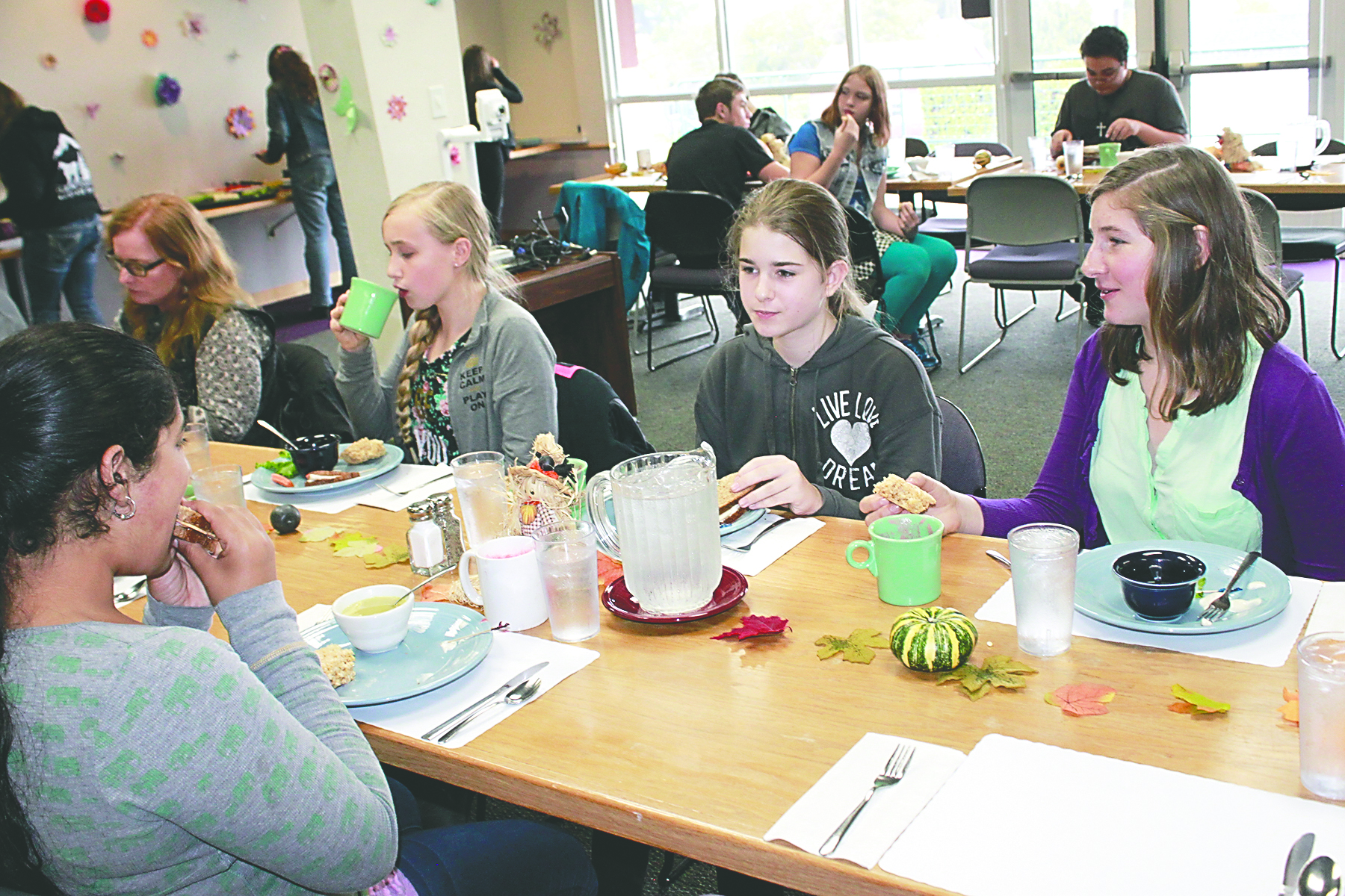 Several September Stevens Middle School Students of the Month enjoy lunch with school counselor Nancy Bowman. From left are Bowman