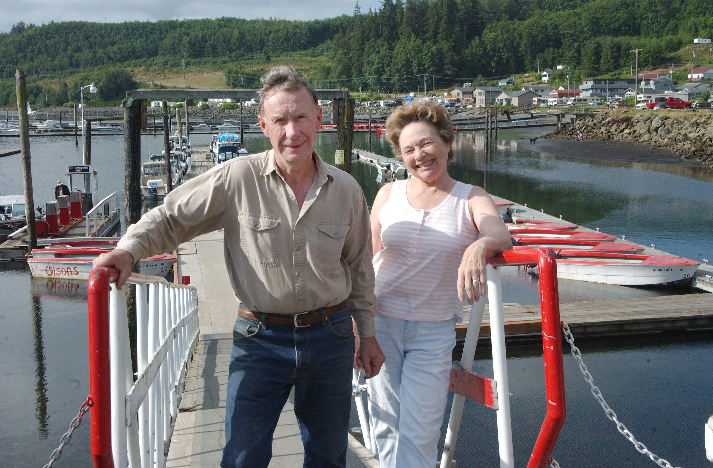 Arlen and Donalyn Olson stand at their Sekiu fishing resort last summer. The sale to an Idaho family was final last week. —Photo by Lonnie Archibald/for Peninsula Daily News