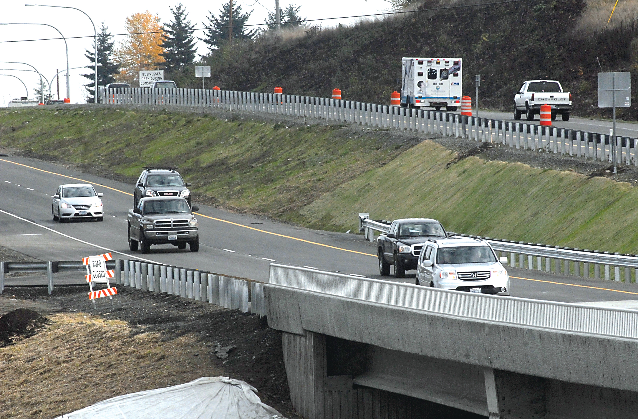 Reconstructed U.S. Highway 101 between Shore and Kitchen-Dick roads between Port Angeles and Sequim is now four-lane — and on different levels in this segment near the new twin McDonald Creek bridges. —Photo by Keith Thorpe/Peninsula Daily News