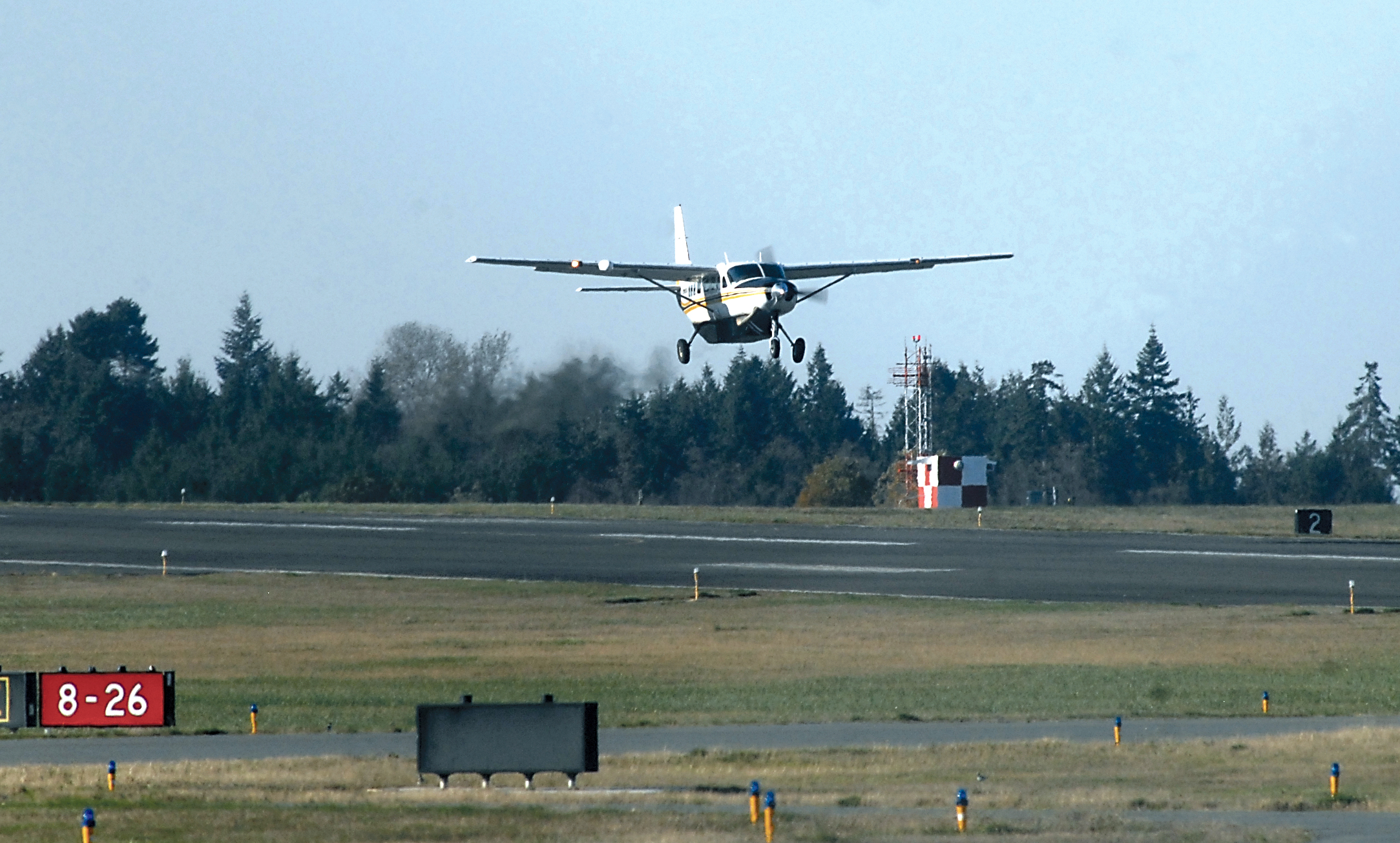 Kenmore Air Express' final flight from Port Angeles takes off from William R. Fairchild International Airport on Friday.  —Photo by Keith Thorpe/Peninsula Daily News