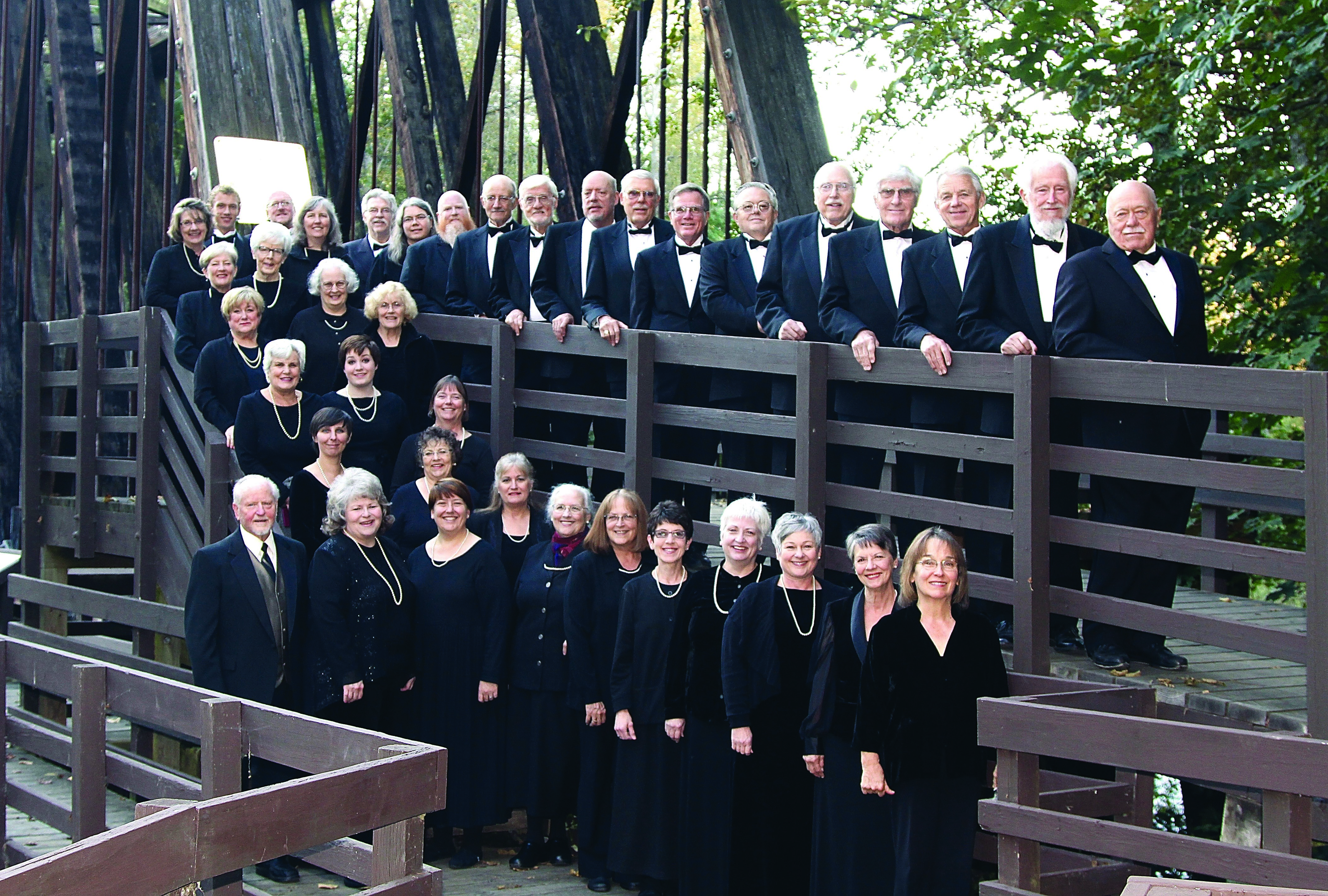 The Peninsula Singers at Sequim’s Railroad Bridge Park.  -- Photo by Dave Logan