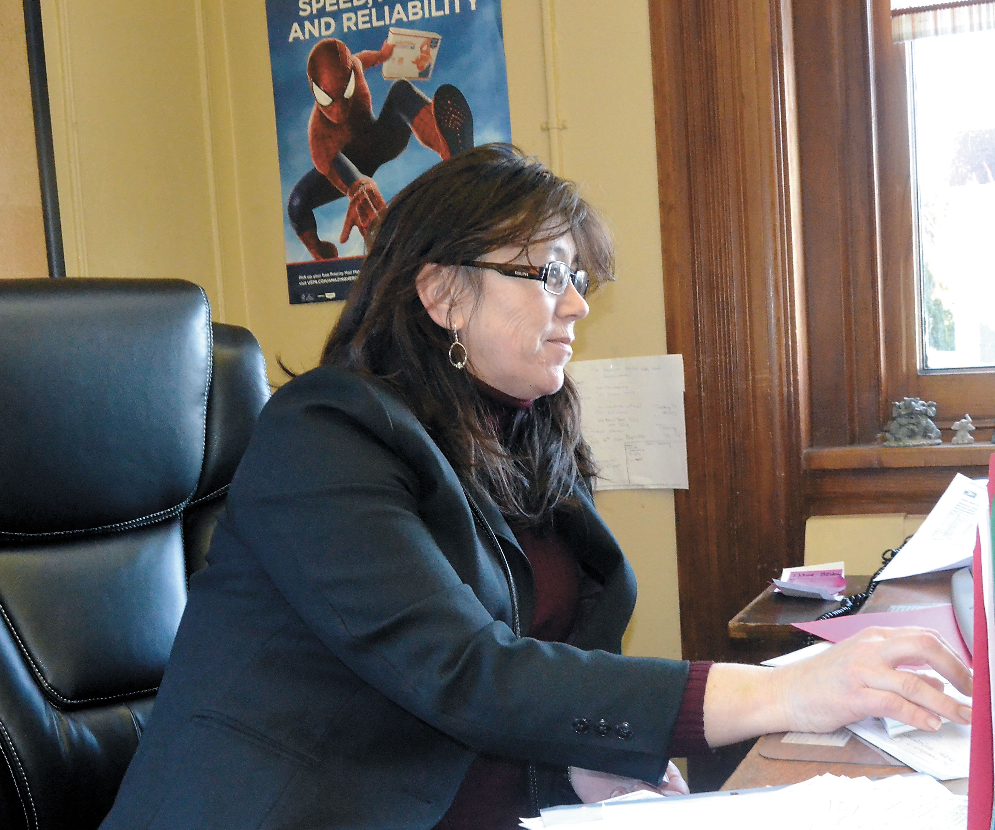 Kathy Kent arrived this week as the new officer in charge at the Port Townsend Post Office. — Charlie Bermant/Peninsula Daily News