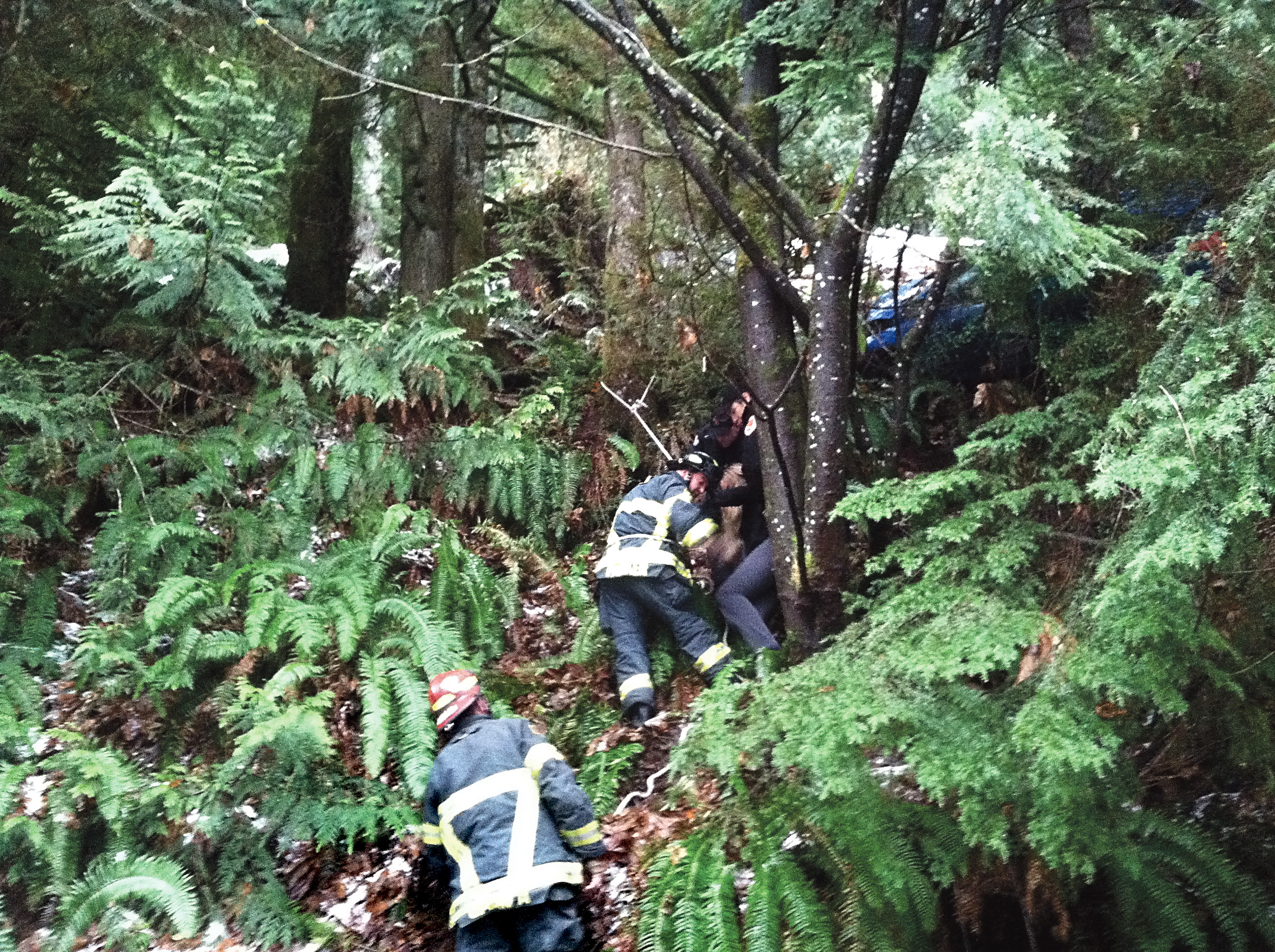 Emergency responders at the scene of a wreck near Lake Sutherland on Thursday.