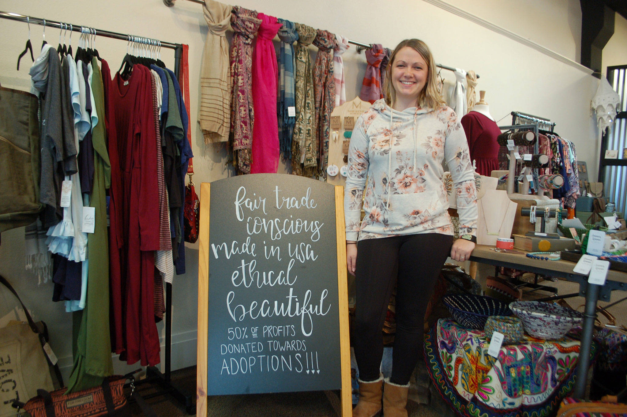 Chelsea Dutta stands in her and her husband’s fair trade boutique, Amma’s Umma, in Port Angeles where the proceeds go to families who wish to adopt and adoption efforts. Erin Hawkins/Olympic Peninsula News Group