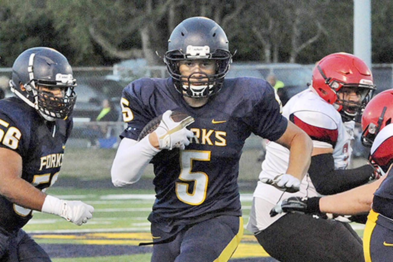 ALL-PENINSULA FOOTBALL MVP: Forks’ Cole Baysinger runs away with honor