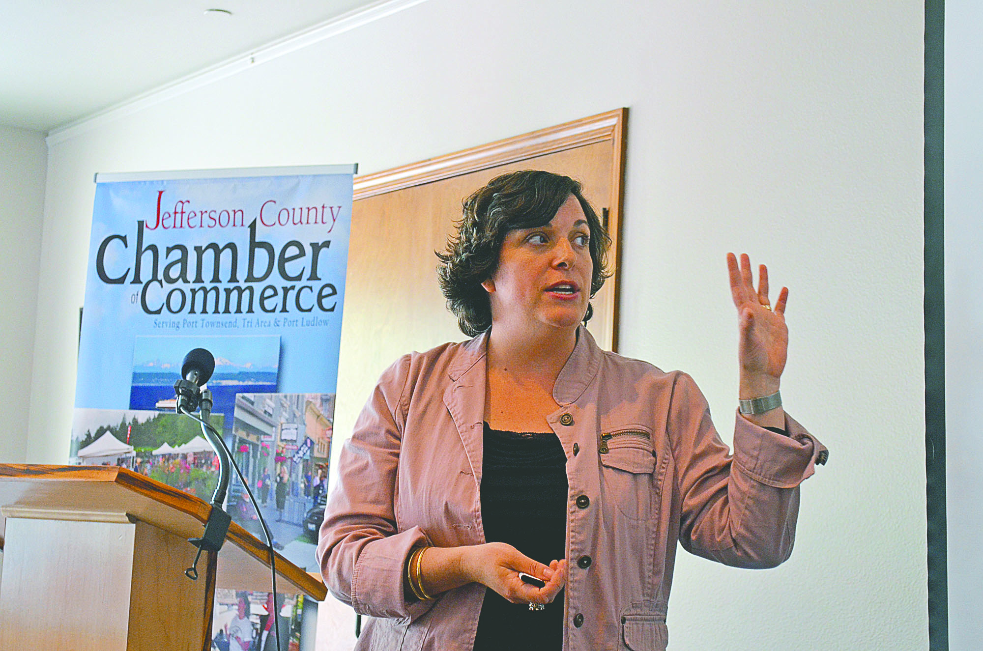 WSU Extension Director Laura Lewis addresses the Jefferson County Chamber of Commerce luncheon Monday.  -- Photo by Charlie Bermant/Peninsula Daily News