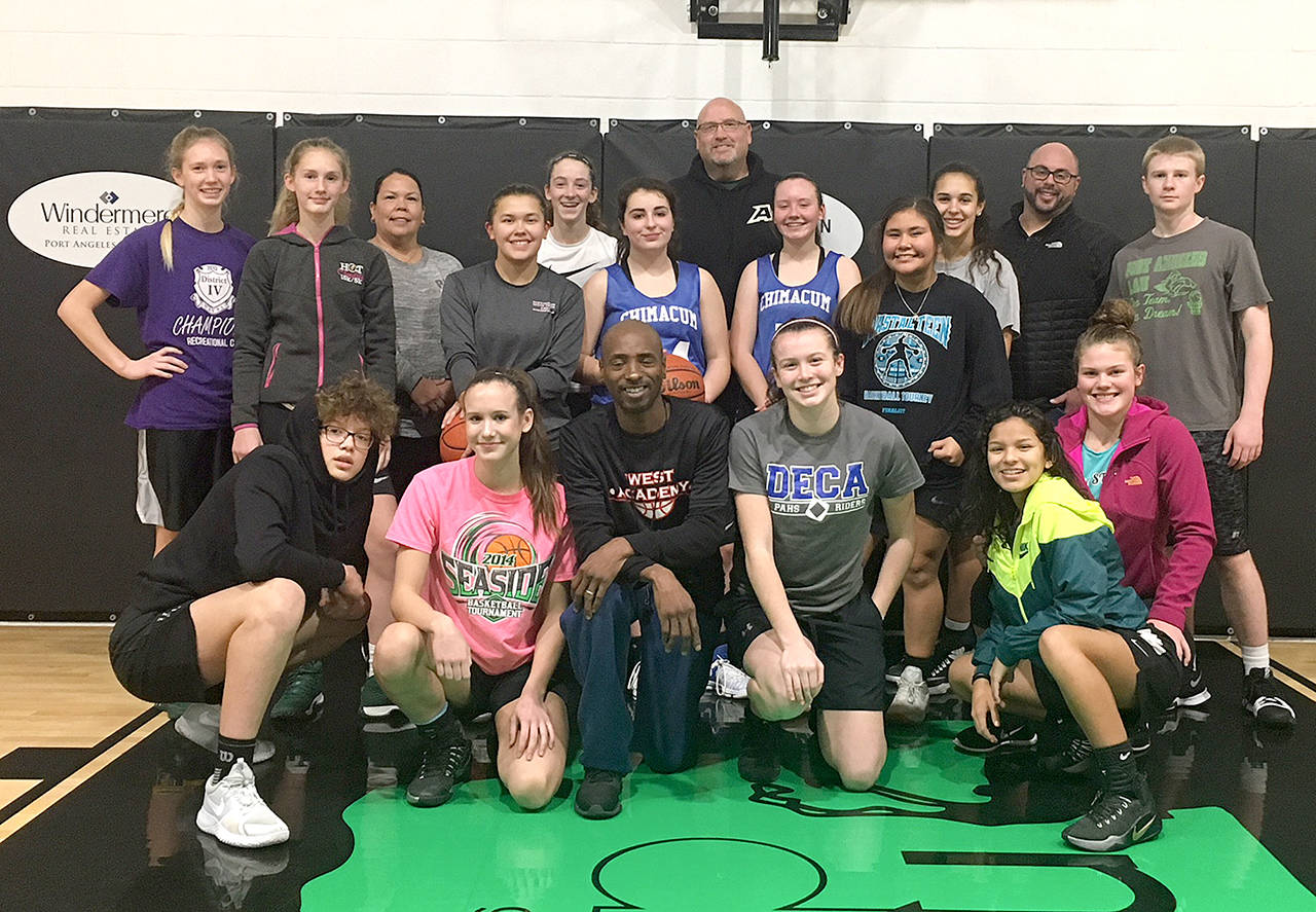 Jimmy Anderson of Olympia’s Anderson Athletics conducted 12 training sessions at The Warehouse Training Court this weekend working with more than 70 athletes from the Olympic Peninsula. Athletes and coaches pictured are: Gracie Long, Emilia Long, Madison Cooke, Neah Bay assistant coach Laurie McCaulley, Hannah Reetz, Gina McCaulley, Abby Schroeder, Jimmy Anderson, Savannah Huntingford, coach Mike Knowles, Katie Clark, Jaida Wood, Jazzlynn Yallup, Mia McNair, Camille Stensgard, Chimacum head coach Trevor Huntingford, Myra Walker and Brady Nickerson.                                (Joe Marvelle photo )