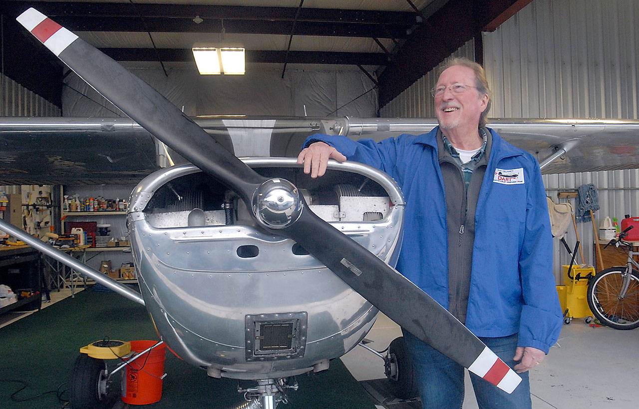 Alan Barnard, shown with his vintage Cessna 150 aircraft at William R. Fairchild International Airport in Port Angeles, is working to develop the Disaster Airlift Response Team to help Clallam County residents in the wake of a catastrophic earthquake. (Keith Thorpe/Peninsula Daily News)