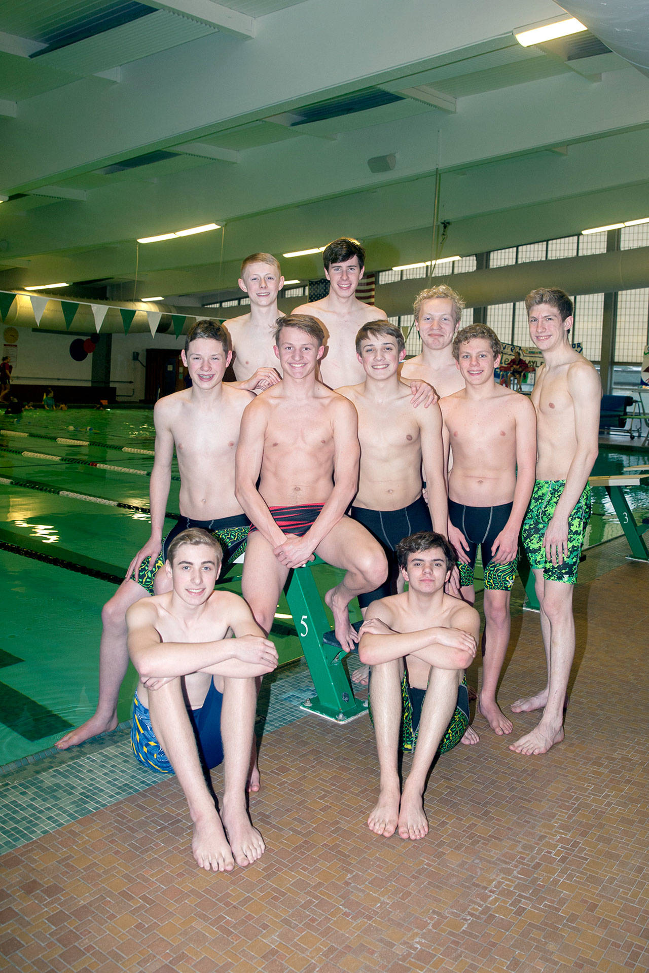 Patty Reifenstahl Port Angeles Swimmers and divers heading to Renton to compete in the West Central District meet this weekend are, back row from left, Carter Droz, Andrew Methner, Halen Gerhard, middle row, Taylor Martin, Alex Hertzog, Henry Shaw, Nate Toscano, and sitting, Crescent’s Micah Scott and Jonathan Maestas.