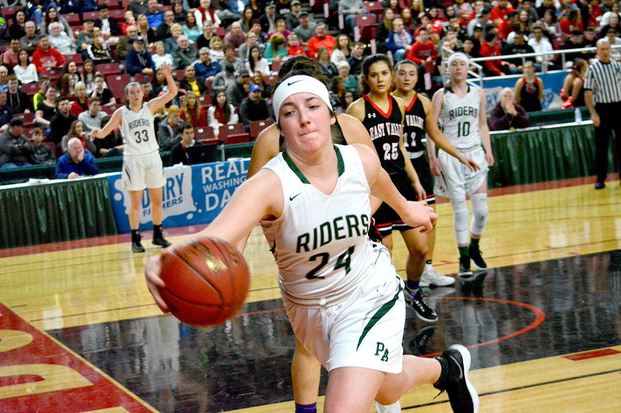 Port Angeles’ Aeverie Politika lunges to save a loose ball in the Roughriders’ game against East Valley of Yakima in the state 2A tournament at the SunDome on Wednesday. East Valley got up 30-5 in the first half and the Rider girls were not able to recover in a 53-26 loss. (Mark Krulish/Kitsap News Group)