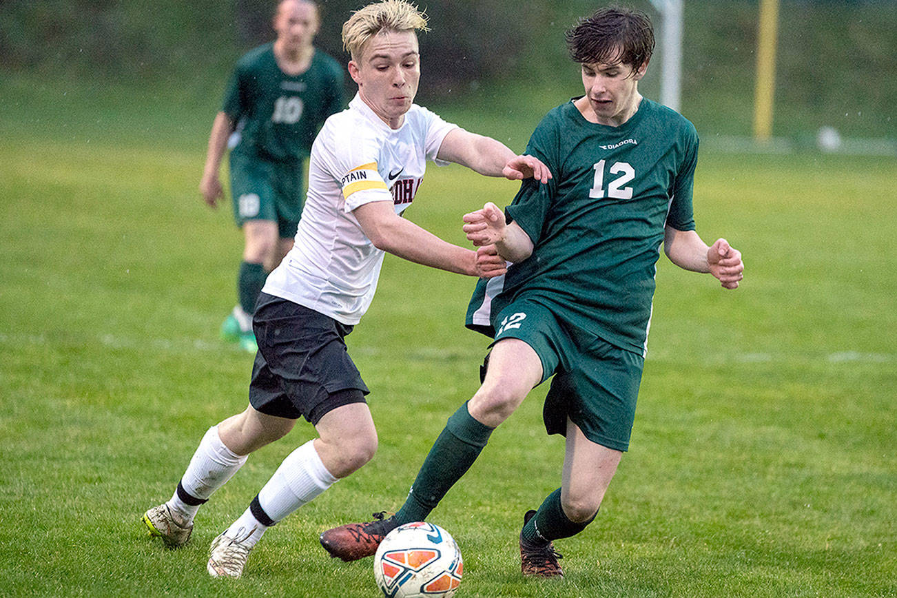 PREP SOCCER: Port Angeles boys overcome rain, Port Townsend