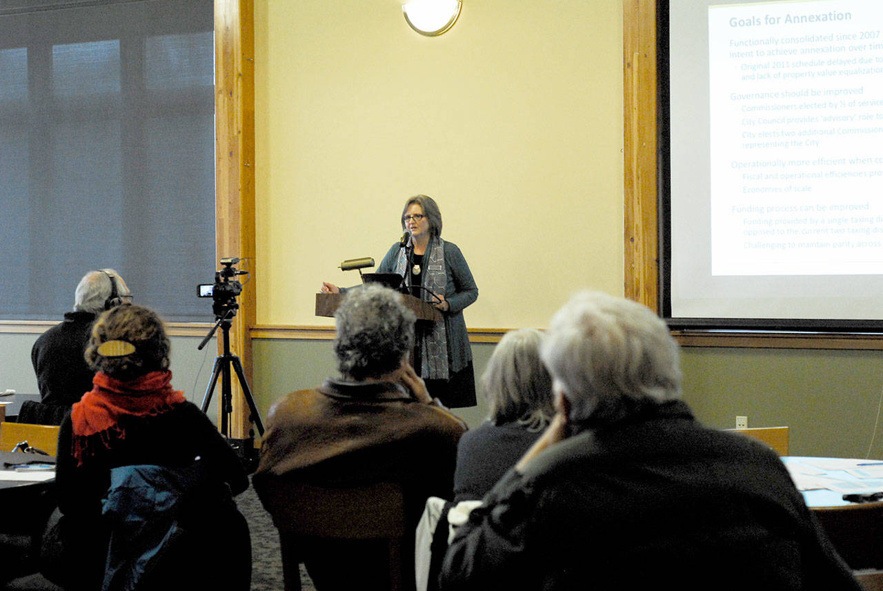 Mayor Deborah Stinson addresses community members who turned out Thursday for the first of three informational meetings exploring the possibility of annexing the city into East Jefferson Fire Rescue. (Jeannie McMacken/Peninsula Daily News)