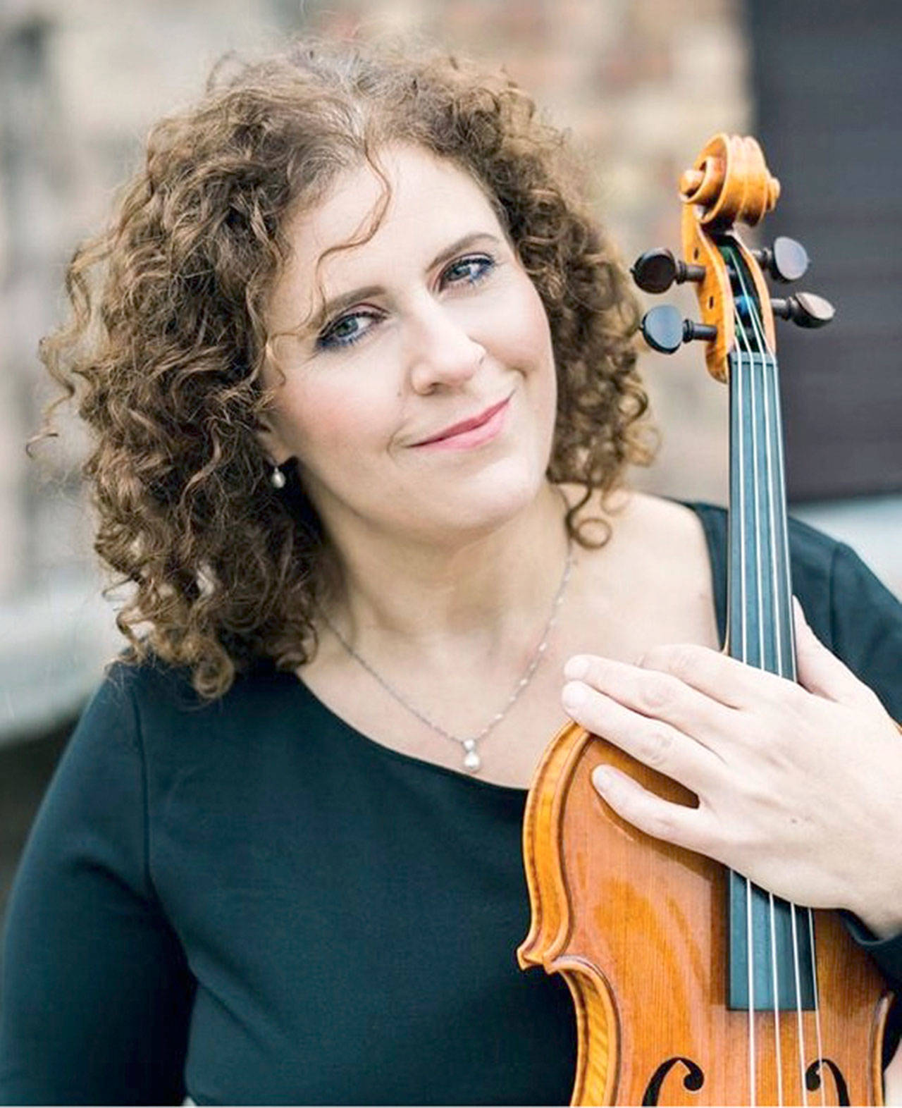 Violist Cheryl Landry Swoboda returns to her home town of Port Angeles for a concert of Brahms, Bartok and Berlioz this Saturday.