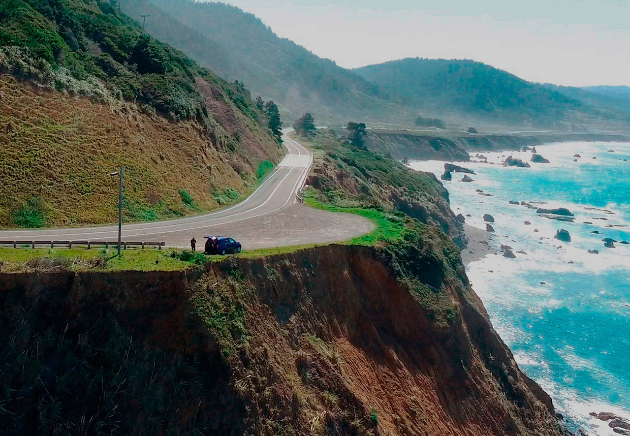 This March 28, aerial file photo taken from Alameda County Sheriff’s Office drone video, courtesy of Mendocino County, shows the pullout where the SUV of Jennifer and Sarah Hart was recovered off Pacific Coast Highway 1, near Westport, Calif. (Alameda County Sheriff’s Office via AP)