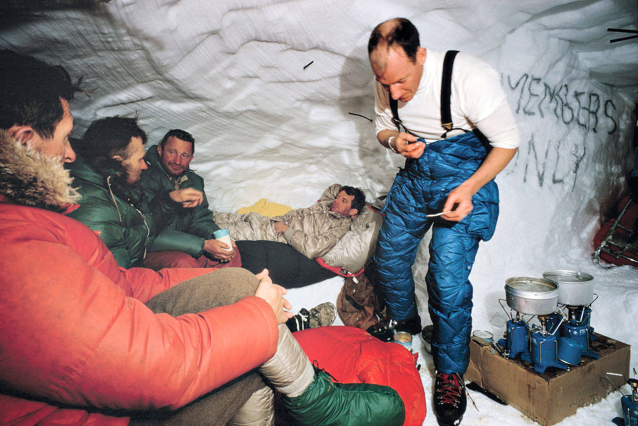 “Return To Mount Kennedy,” a new documentary film debuting this weekend, follows two of Jim Whittaker’s sons and the son of Bobby Kennedy as they recreate the climb done by Sen. Robert F. Kennedy and Jim Whittaker in 1965. Pictured here are Kennedy on the cot and Whittaker, along with other members of the 1965 climbing party.