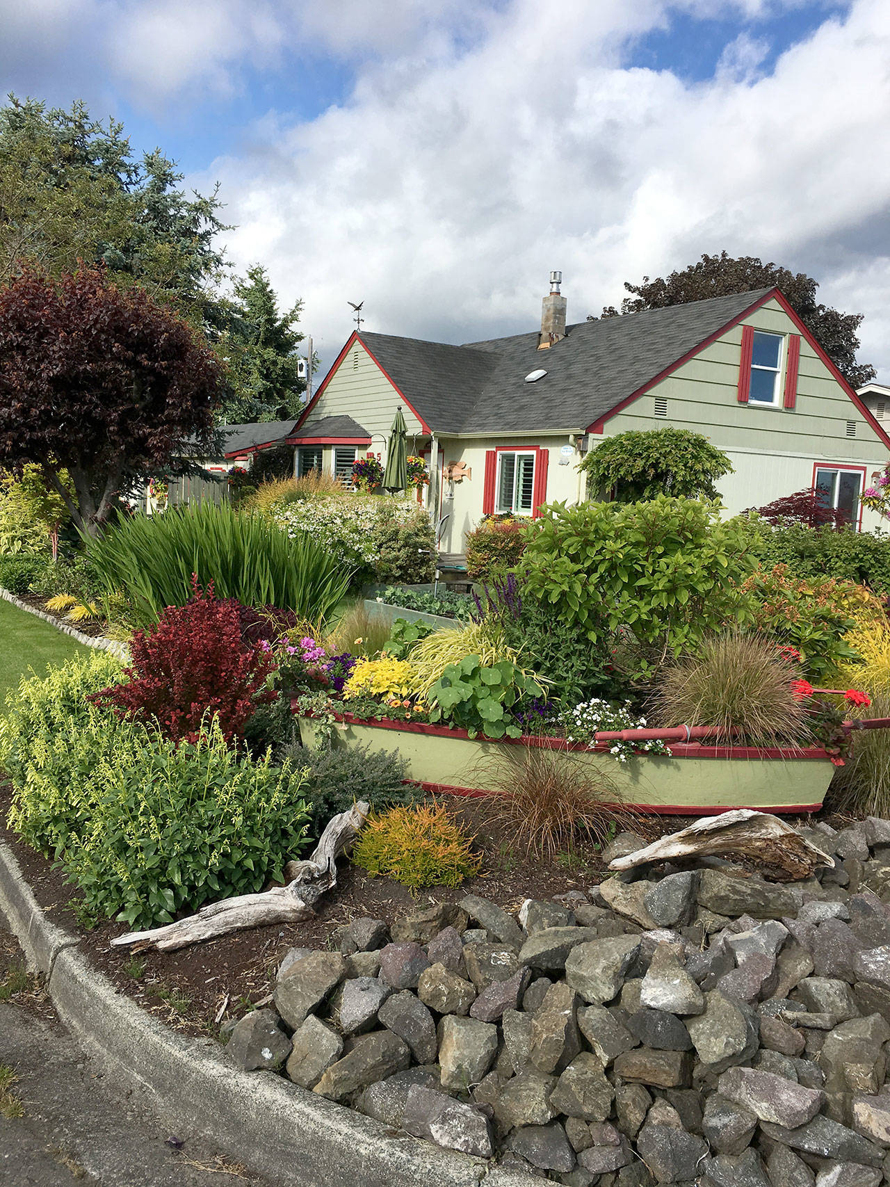 The Fitzsimmons gardens are one of six Port Angeles area gardens on display at the Petals and Pathways Home Garden Tour on Saturday.