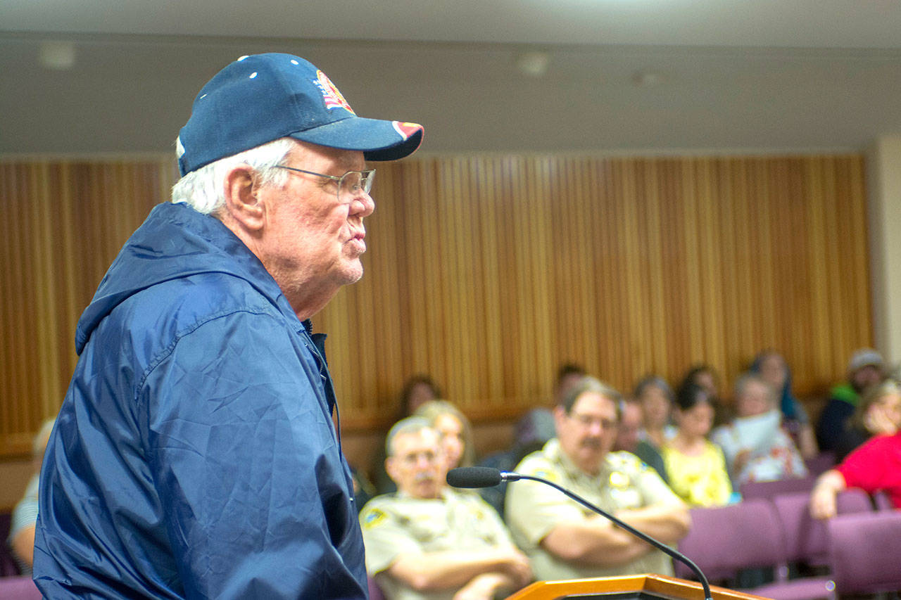 Bob Forde tells Clallam County commissioners that he opposes a county-wide ban on fireworks. (Jesse Major/Peninsula Daily News)