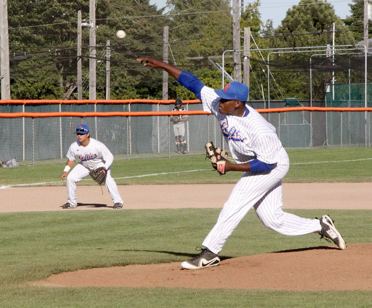 Dave Logan/for Peninsula Daily News Lefties first baseman/pitcher Ron Brown is growing as a player at the plate and on the mound for Port Angeles this summer.