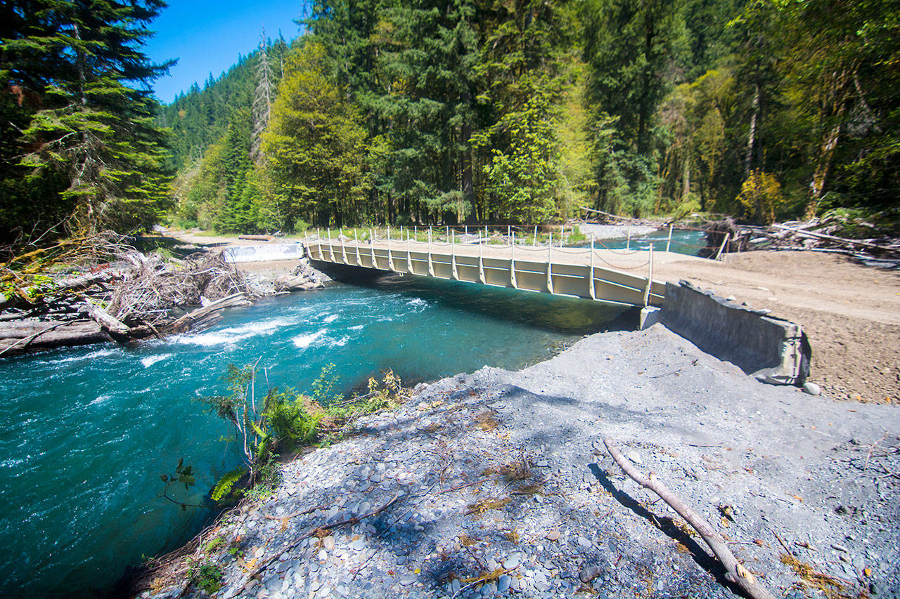 The Elwha River flows under a new temproary bridge that was installed last week. The bridge is not open to public vehicle access and Olympic Hot Springs Road is still closed to vehicle traffic. (Jesse Major/Peninsula Daily News)