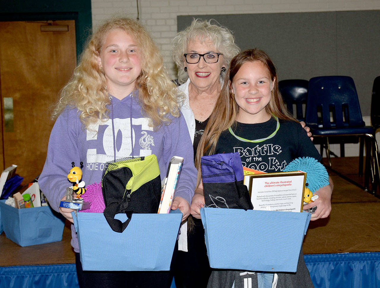 From left, Mikayla DeCou, Soroptimist International Port Angeles Jet Set member Marsha Robin and Cami Bohman. (Patsene Dashiell/Port Angeles School District)