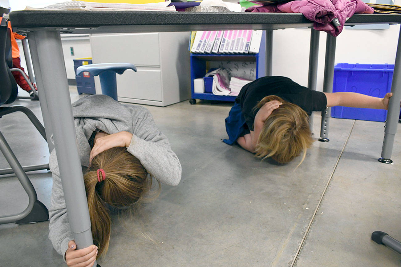 Grade-school students among those who practice earthquake drill