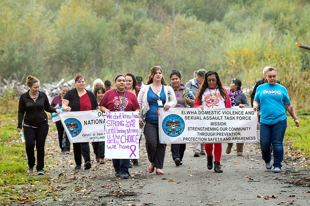 Lower Elwha Klallam tribal members march to raise domestic violence awareness