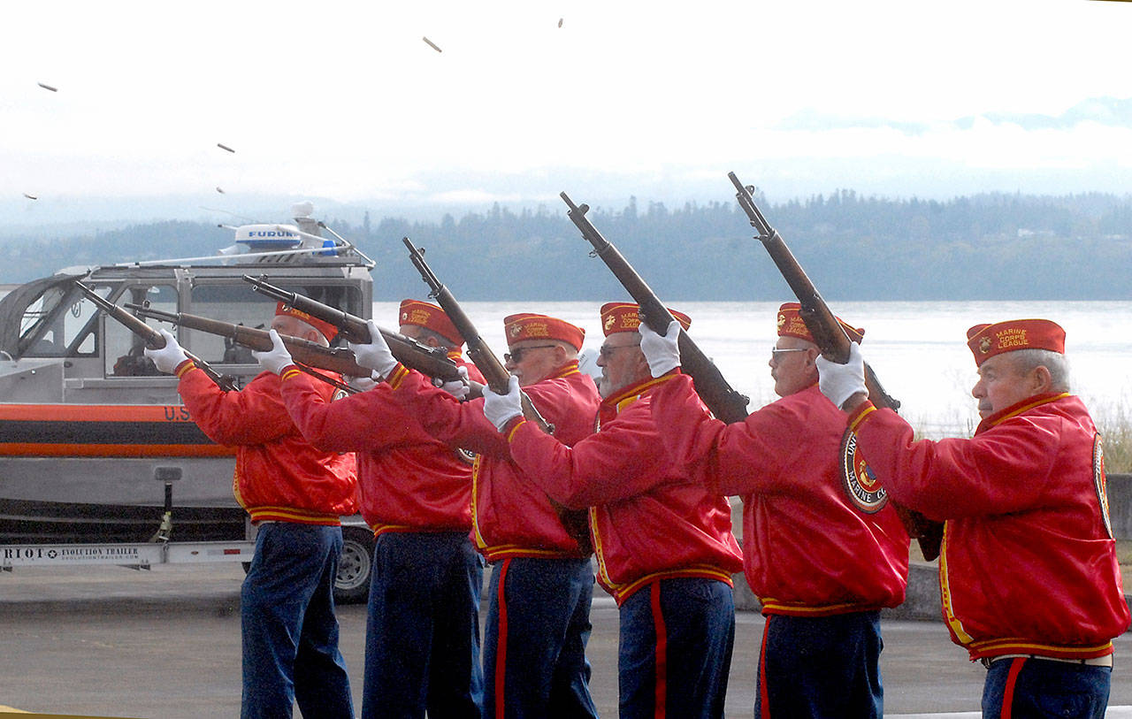 Members of the Mount Olympus Detachment 897 of the Marine Corps League deliver a rifle salute during the 2017 Veterans Day ceremony in Port Angeles. (Keith Thorpe/Peninsula Daily News)