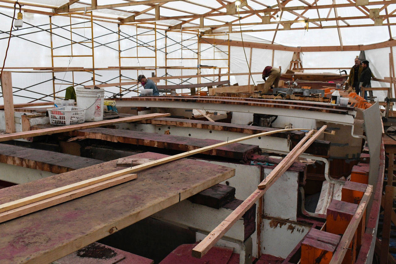 The schooner Adventuress is undergoing the last phase of its decade-long restoration this winter at Port Townsend Boat Haven. Shipwrights and tradespeople from Haven Boatworks have taken the tall ship down to its bones to replace the deck, a project that is expected to take 10,000 man hours to complete. The supports will be made from wood sourced from Africa. The deck will be crafted from Douglas fir from Vancouver Island. (Jeannie McMacken/Peninsula Daily News)