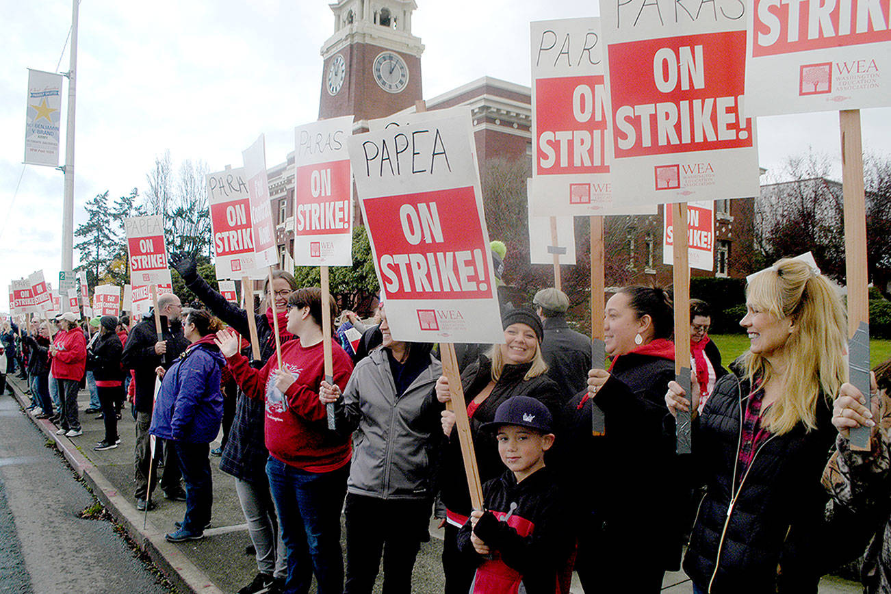 Kaston Beckett, 6, joined the crowd Friday in front of the Clallam County Courthouse as it supported striking Port Angeles School District paraeducators. (Paul Gottlieb /Peninsula Daily News)