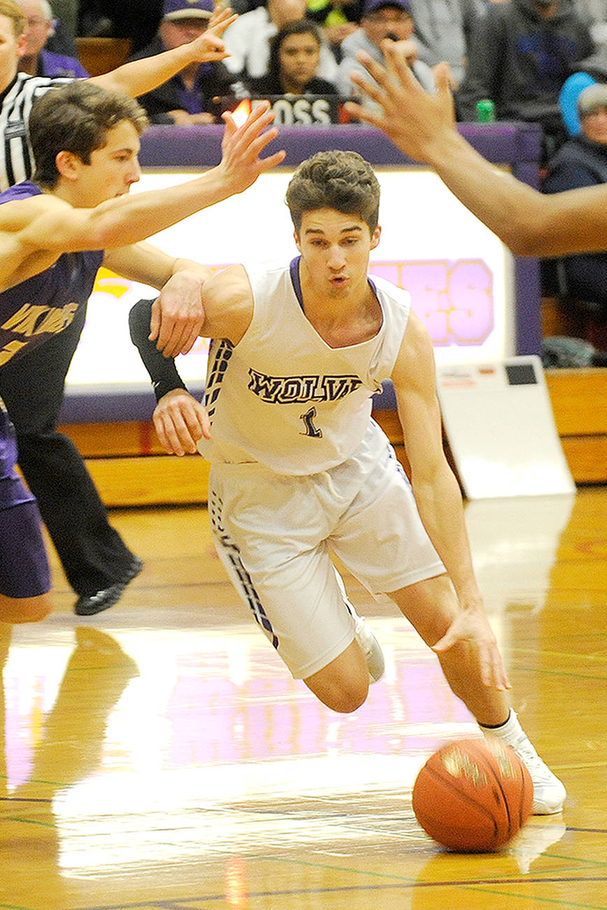 BOYS BASKETBALL ROUNDUP: North Kitsap beats Sequim in showdown for top spot in Olympic League; Port Angeles tames Trojans; Forks beats Chimacum