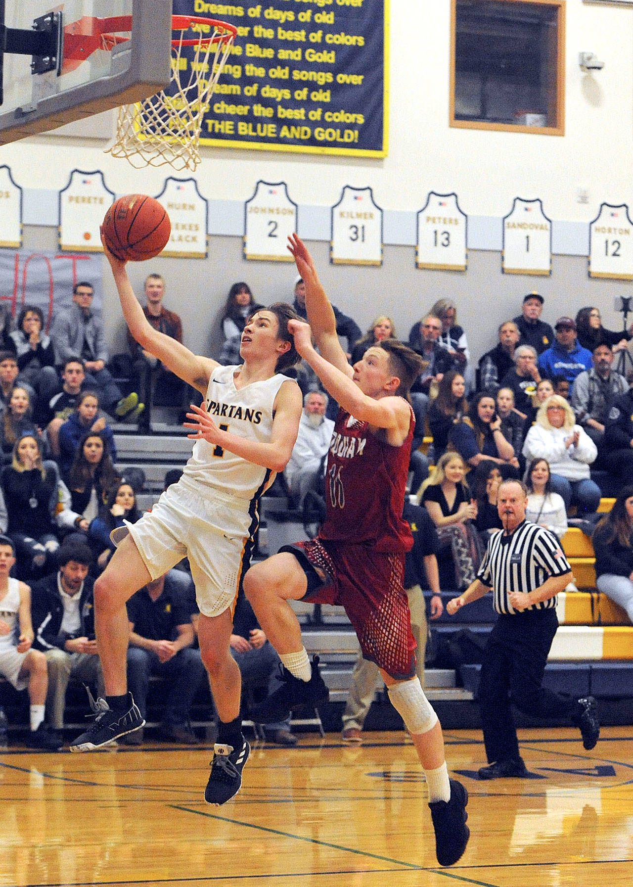 Forks’ senior point guard Seth Johnson was vital to the Spartans’ success this season. (Lonnie Archibald/for Peninsula Daily News)