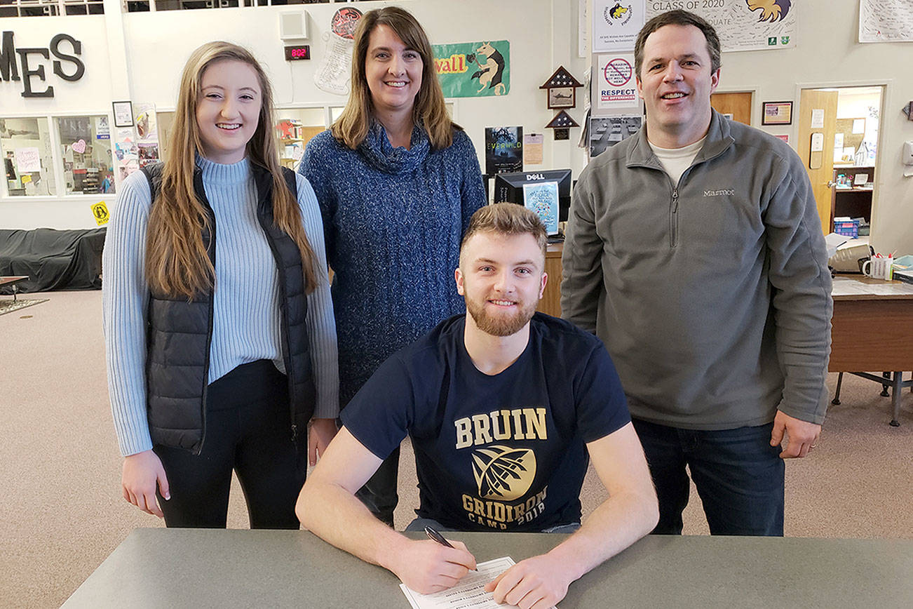 FOOTBALL: Sequim’s Riley Cowan signs to play football at George Fox University