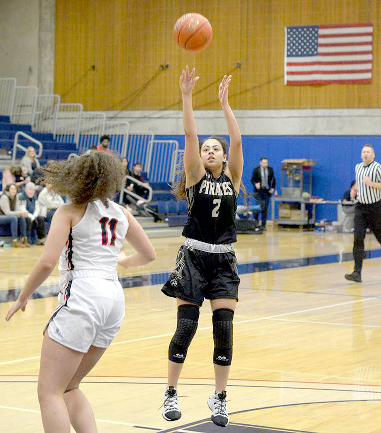 Rick Ross Peninsula’s Leilani Padilla shoots against Bellevue. Padilla led the team with 18 points in the Pirates’ 82-57 win that locked up a North Region championship.