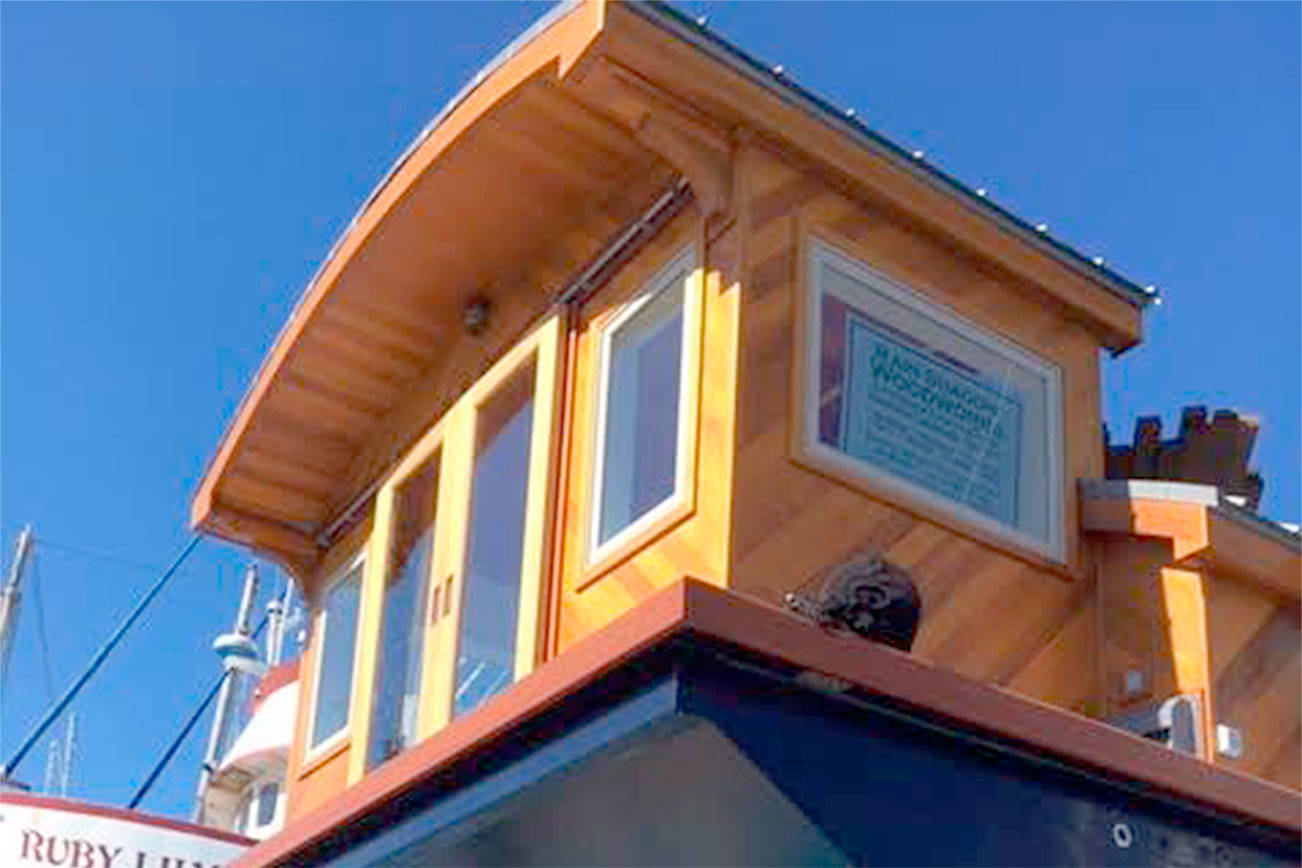 PHOTO: House barge launched in Port Townsend