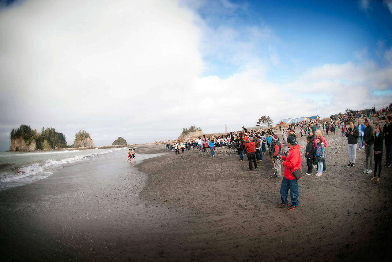 Community members welcome the annual migration of the gray whales in a recent ceremony.