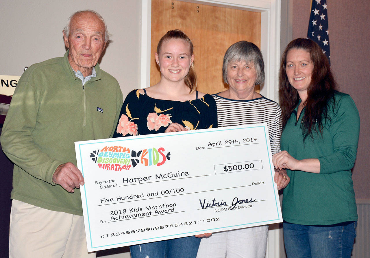 From left, Gene Turner, Harper McGuire, Norma Turner and Victoria Jones, North Olympic Discovery Marathon race director. (Harper McGuire Photo/Courtesy of PASD)