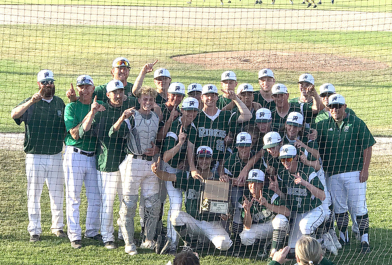 The Port Angeles Roughriders baseball team celebrates in Tacoma after winning the West Central District III 2A tournament championship Saturday night by beating Fife 3-2 in eight innings.