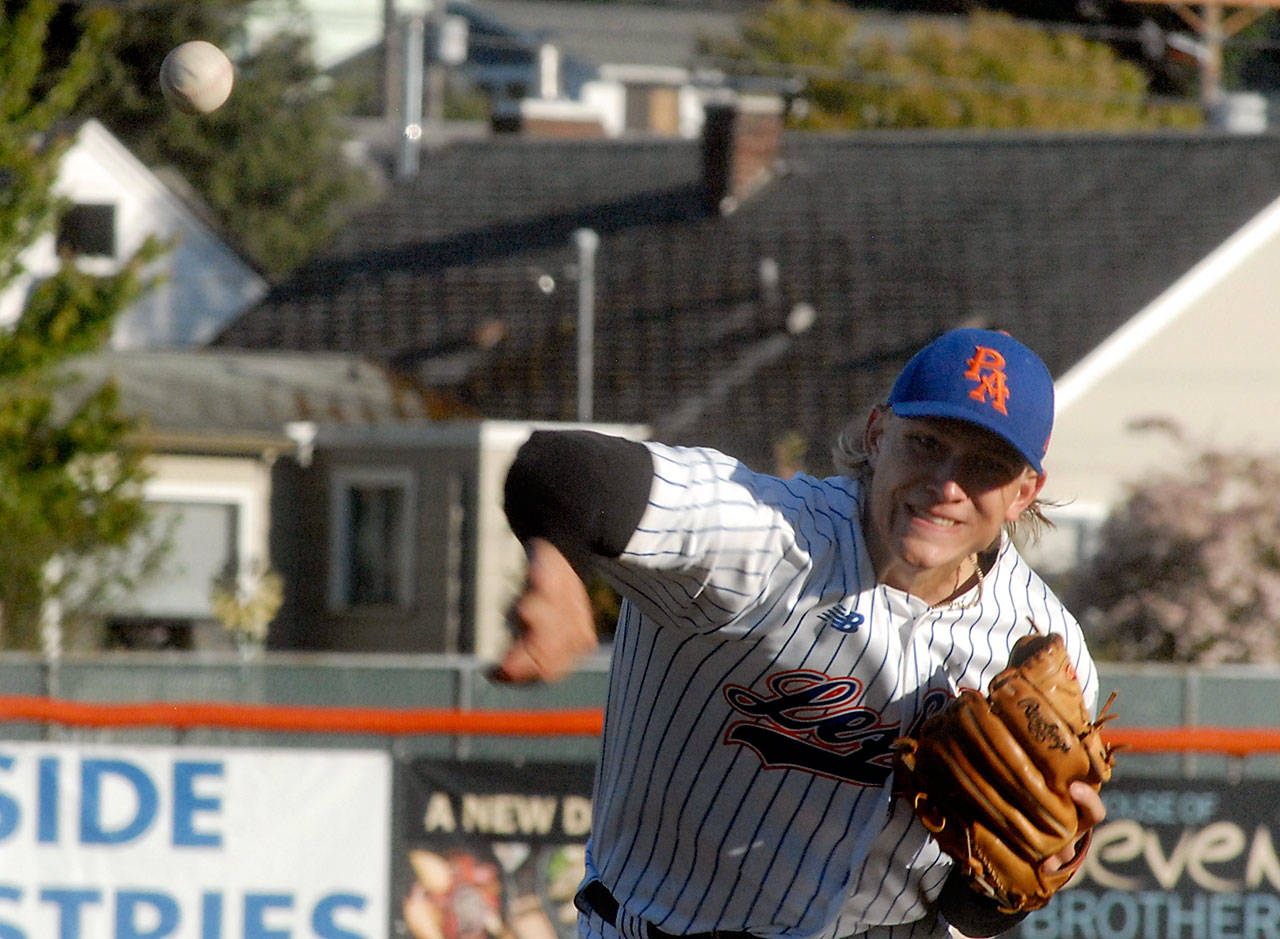 Keith Thorpe/Peninsula Daily News Lefties pitcher Carter Loewen throws in the third inning against the Bellingham Bells on Friday in Port Angeles.