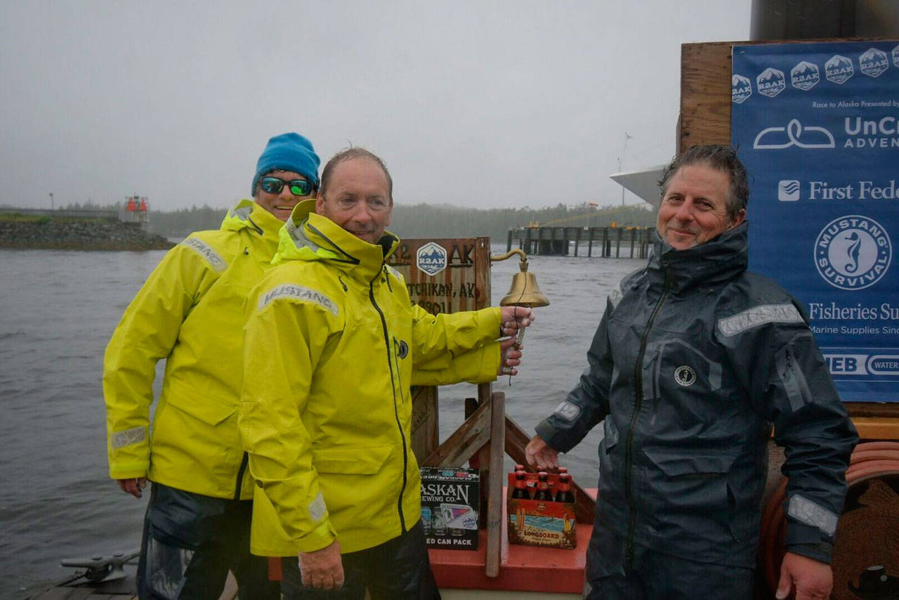 Team Pear Shaped Racing rings the bell in Ketchikan after finishing second in the Race to Alaska. (Charley Starr)