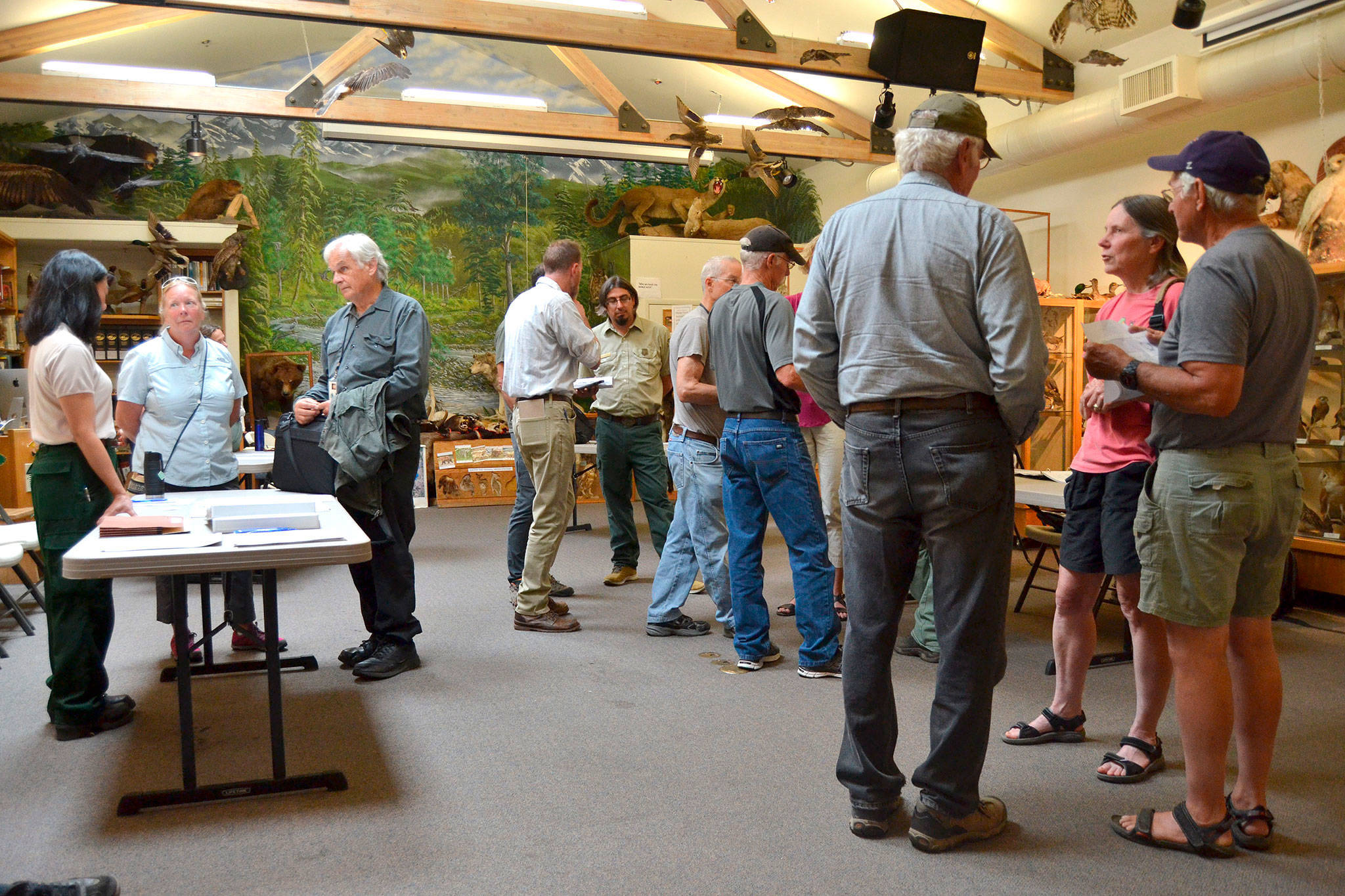 Hikers propose keeping existing roads open to vehicles to keep day hikes at a reasonable distance to U.S. Forest Service staff in August 2018 at the Dungeness River Audubon Center. (Matthew Nash/Olympic Peninsula News Group)