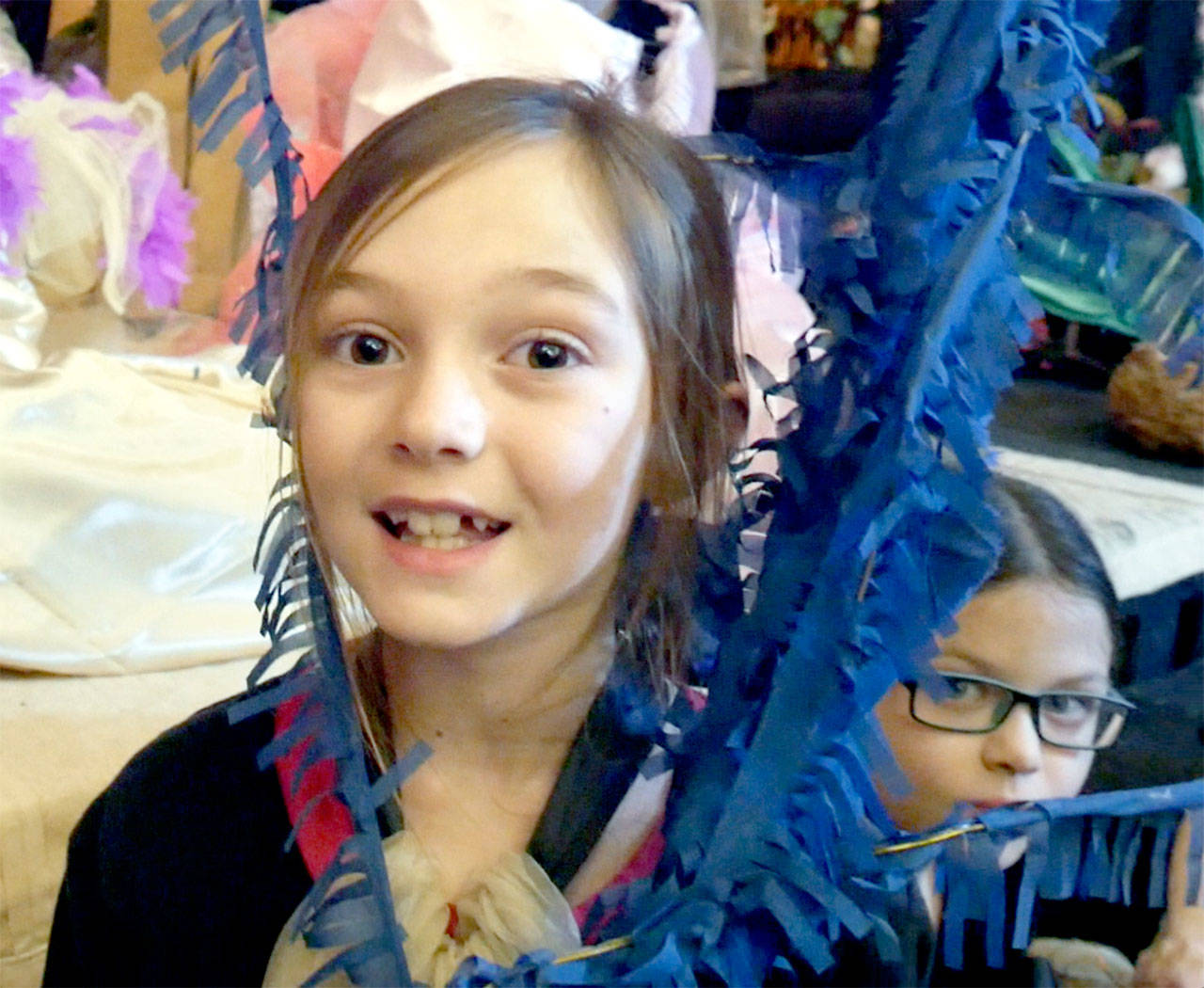 Josepha Johnson, 9, and Lillian Anderson, 10, playing “tube worms” in the tide pools of “The Tidepool Times.”