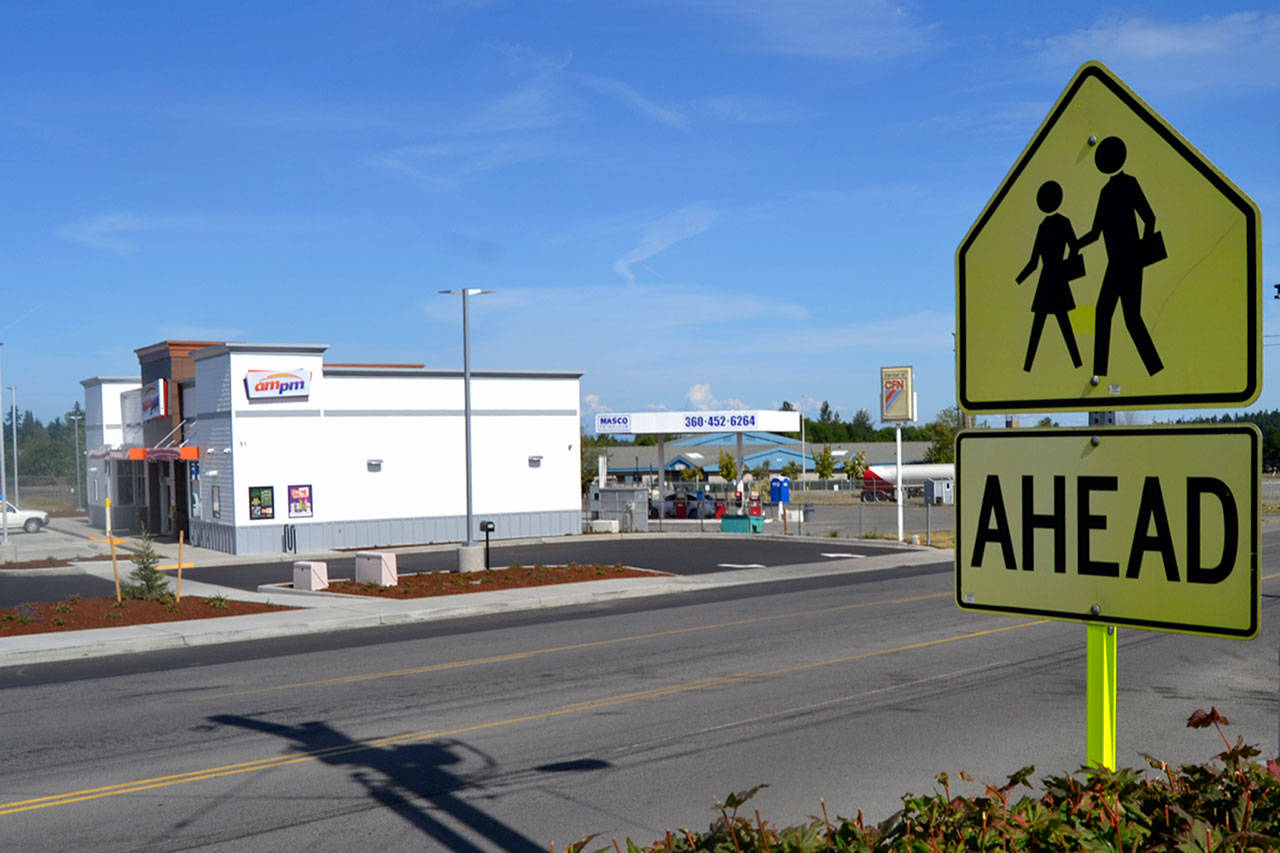 The new 24-hour AM/PM minimart in Carlsborg is pictured with Greywolf Elementary school in the background. (Matt Nash/Olympic Peninsula News Group)