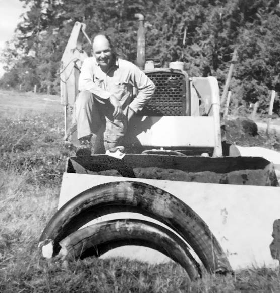 Clare Manis Hatler                                Emanuel Manis is pictured and the two mastodon tusks shortly after he unearthed them on his farm near Sequim on Aug. 8, 1977.