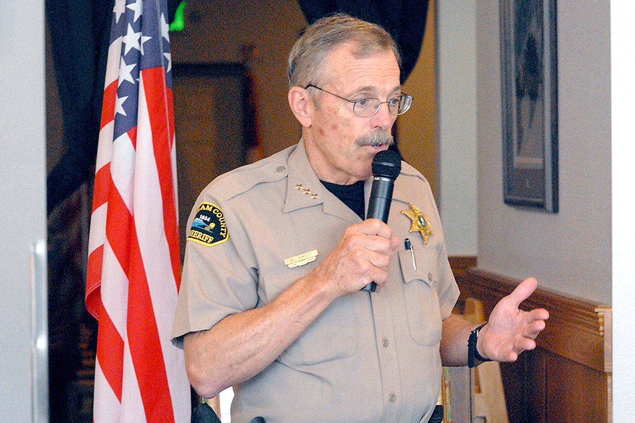 Clallam sheriff tells group he is fulfilling gun law provisions