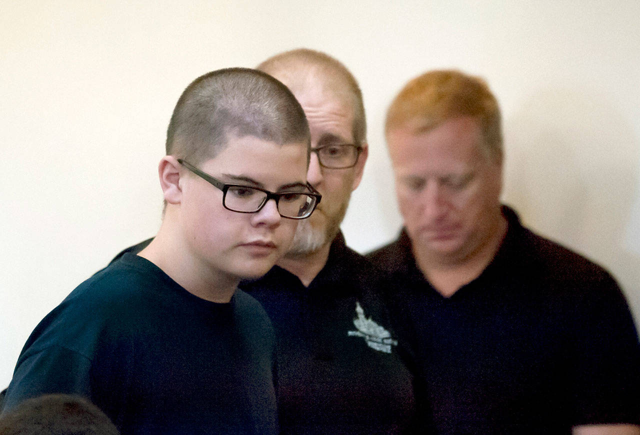 In this Sept. 27, 2017, file photo, Caleb Sharpe walks into Spokane County Juvenile Court in Spokane. (Kathy Plonka/The Spokesman-Review via AP, File)