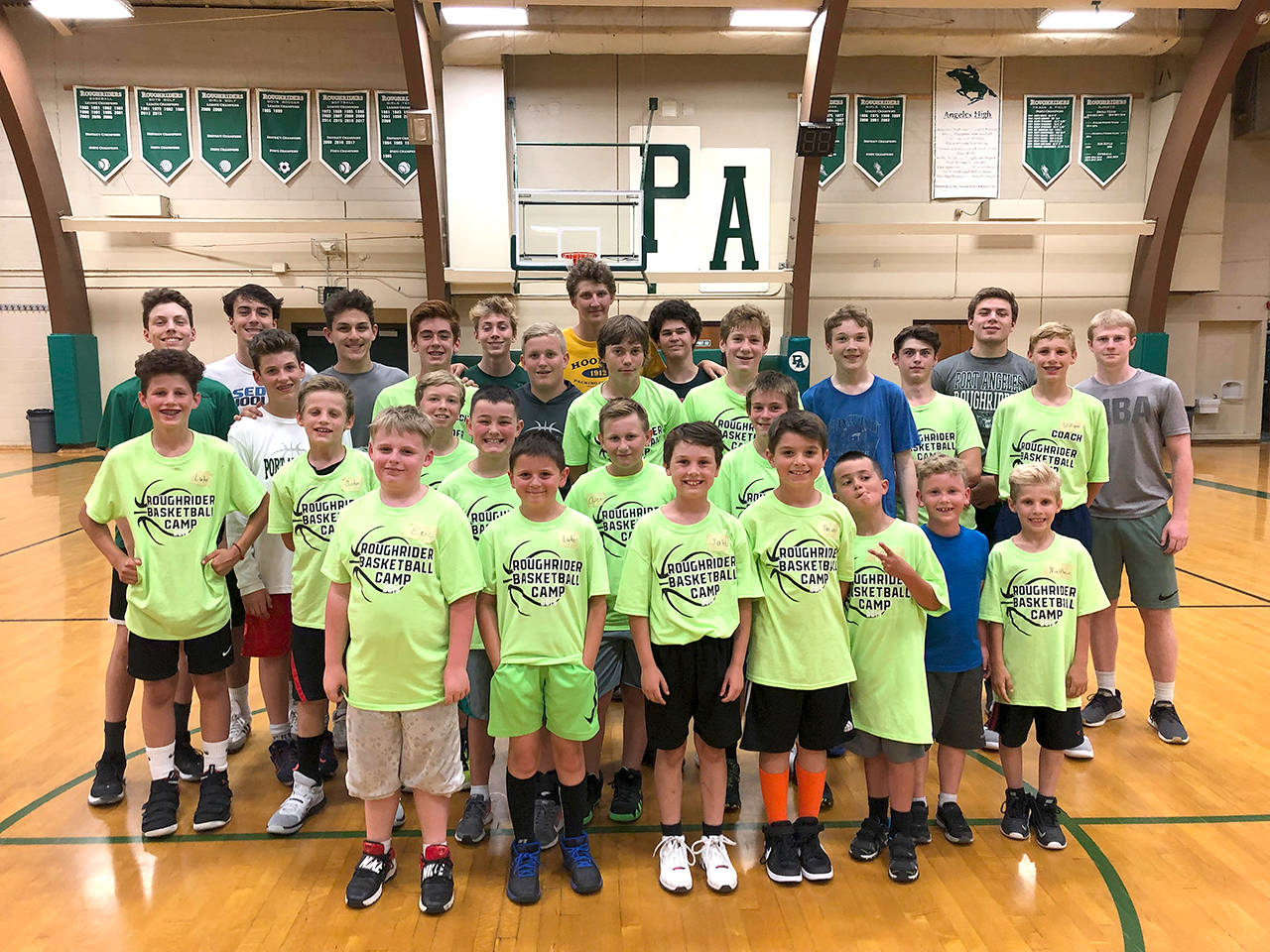 Port Angeles Boys Basketball players and coaches put 25 youth basketball players through the paces during a three-day basketball camp earlier this week.