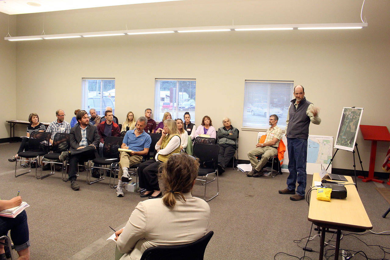 Public Works Director Monte Reinders explains the Port Hadlock Waste Water System to a group of community members in Chimacum on Tuesday night. (Zach Jablonski/Peninsula Daily News)