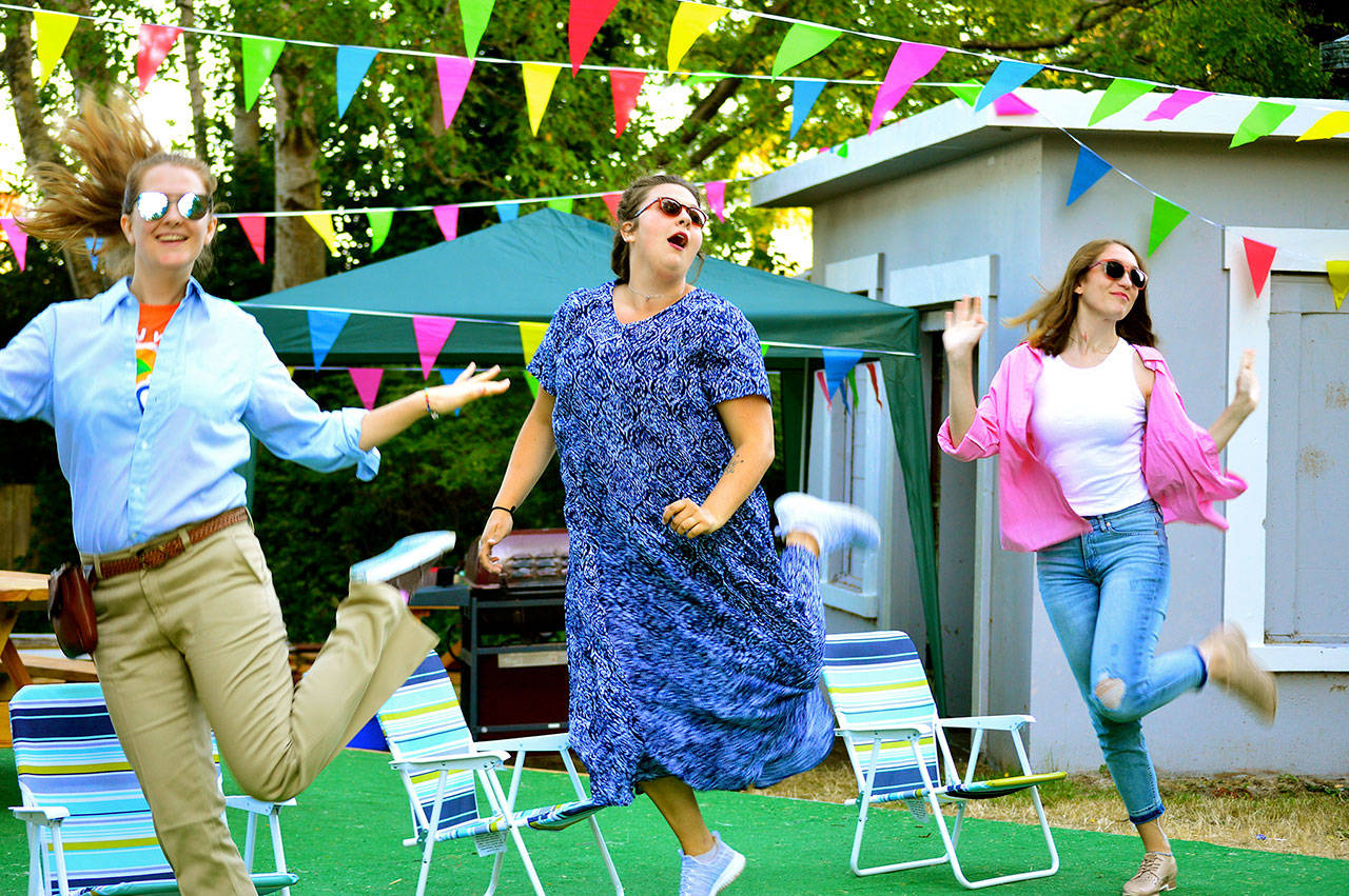 “The Merry Wives of Windsor” becomes a picnic in Port Townsend’s Chetzemoka Park with, from left, Maggie Jo Bulkley, Genevieve Barlow and Selena Tibert. (Diane Urbani de la Paz/for Peninsula Daily News)