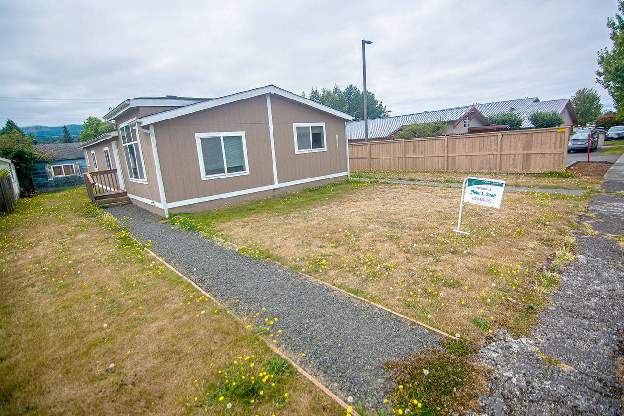 The Olympic Medical Center board unanimously agreed Wednesday to purchase the property at 1120 Caroline Street in Port Angeles so that the hospital can expand its Lung Center. (Jesse Major/Peninsula Daily News)